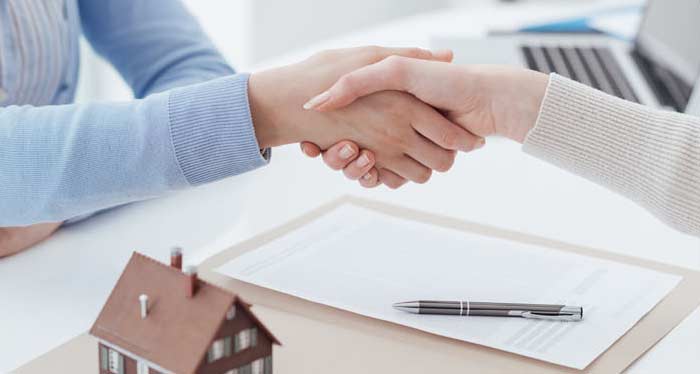 Shaking hands with Loan Officer